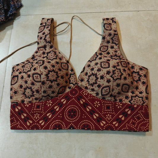 Red & Cream Abstract Printed Cotton Leaf Neck Belted Sleeveless Blouse